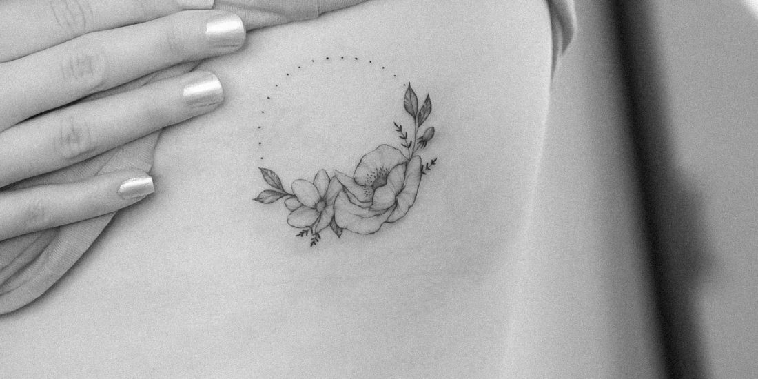 Poppy circle fineline tattoo